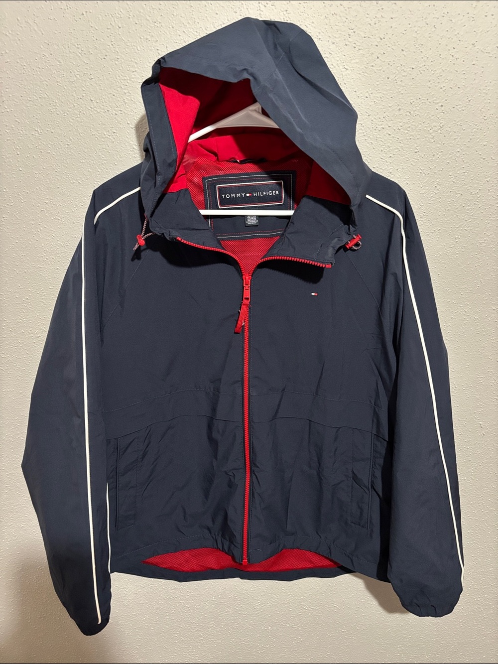 Tommy Hilfiger - NWOT - women’s Navy Windbreaker (size Large)